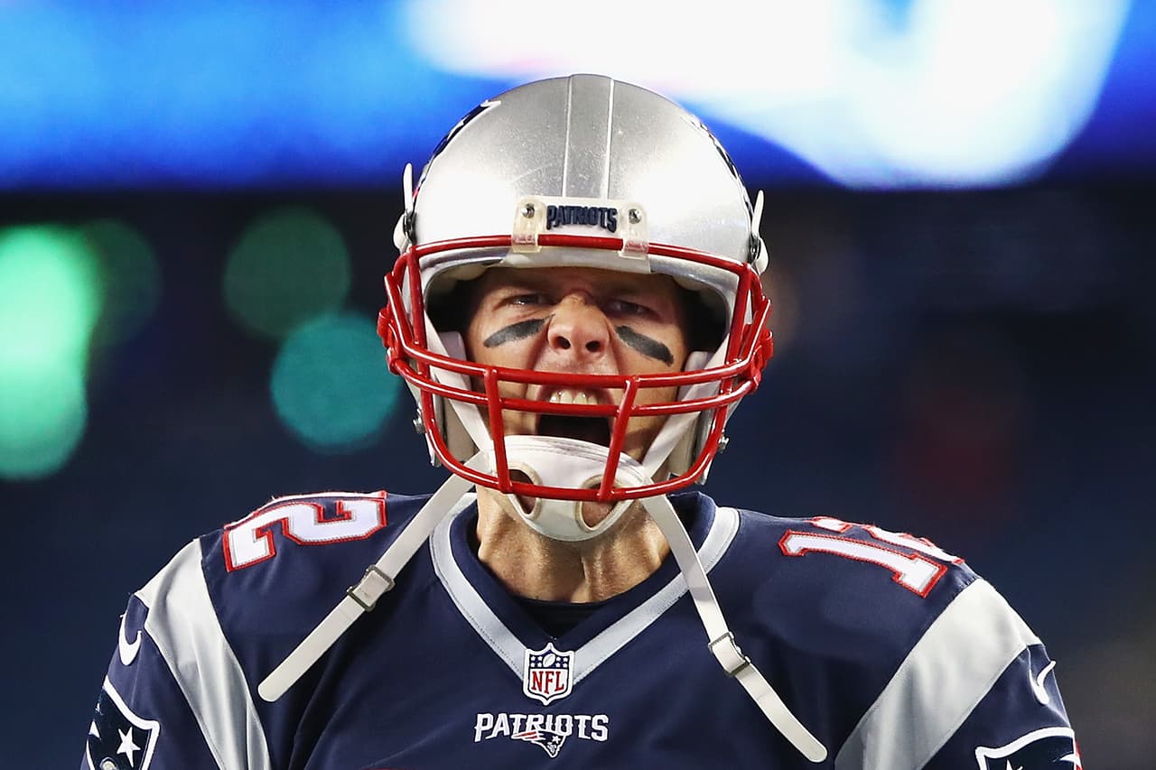 FOXBORO, MA - DECEMBER 12: Tom Brady #12 of the New England Patriots reacts as he runs on the field prior to the game against the Baltimore Ravens at Gillette Stadium on December 12, 2016 in Foxboro, Massachusetts. (Photo by Tim Bradbury/Getty Images)
