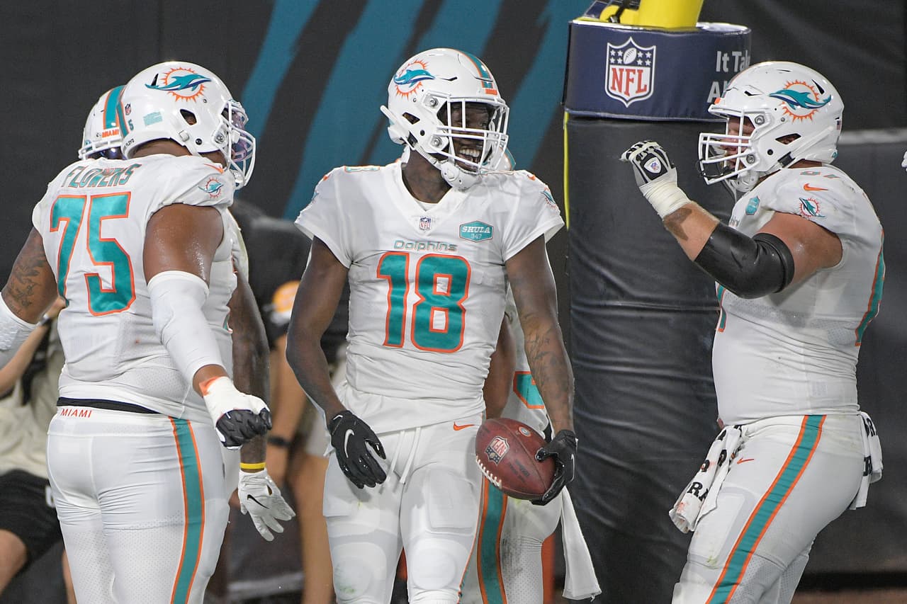 Ryan Fitzpatrick encabeza la paliza 31-13 sobre los Jacksonville Jaguars y los Dolphins consiguen su primer victoria de la campaña.