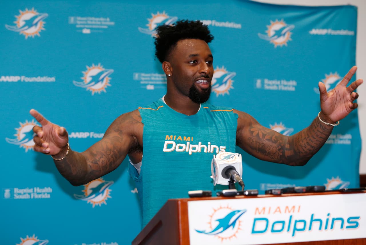 Miami Dolphins wide receiver Jarvis Landry gestures as he speaks during a news conference after an NFL organized team activities football practice, Wednesday, May 31, 2017, at the Dolphins training facility in Davie, Fla. (AP Photo/Wilfredo Lee)