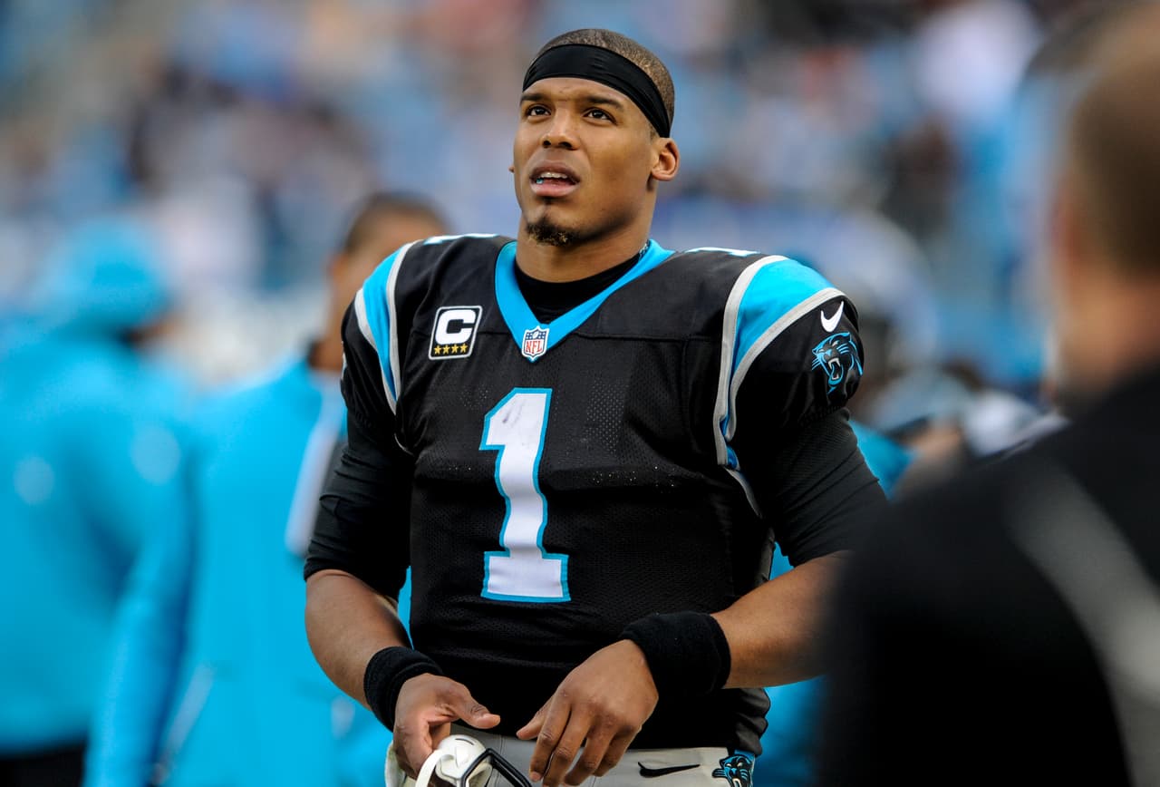 Carolina Panthers quarterback Cam Newton (1) watches late in the second half of an NFL football game against the Atlanta Falcons in Charlotte, N.C. Saturday, Dec. 24, 2016. (AP Photo/Mike McCarn)