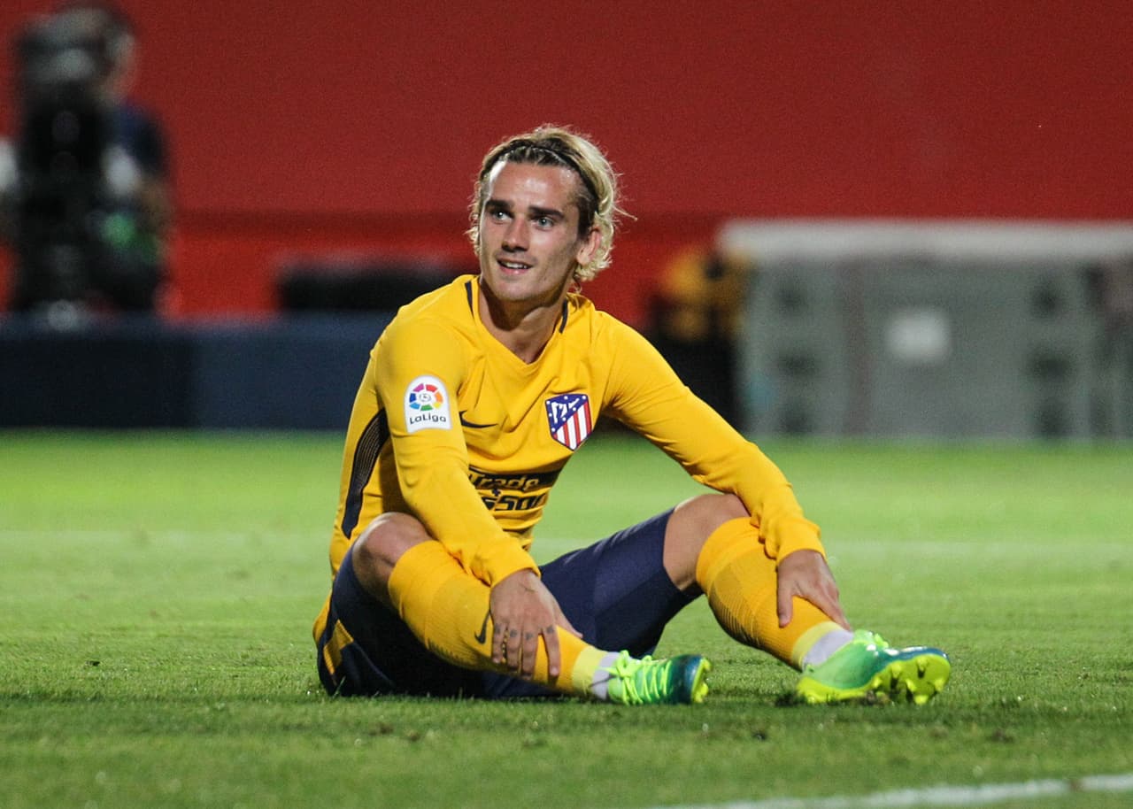 19th August 2017, Montilivi, Girona, Spain; La Liga football, Girona versus Atletico Madrid; Griezmann lies on the pitch after a heavy tackle (Photo by Pedro Salado/Action Plus via Getty Images)