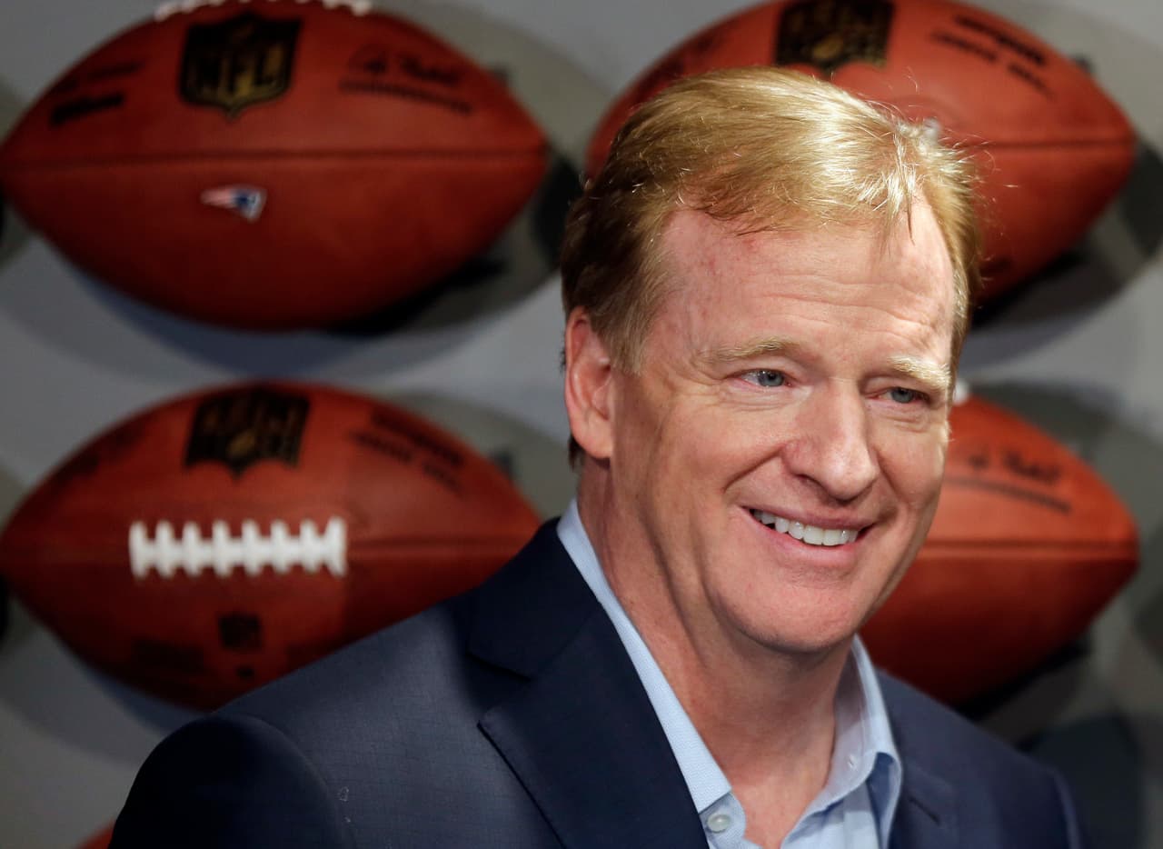 NFL Commissioner Roger Goodell poses for a picture at the opening of NFL Experience in Times Square in New York, Thursday, Nov. 30, 2017. The new attraction has four floors of interactive exhibits and games about football and the NFL. (AP Photo/Seth Wenig)