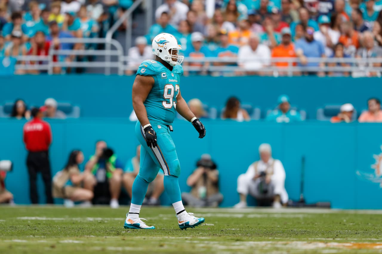 Miami Dolphins defensive tackle Ndamukong Suh (93) looks on during an NFL football game against the New England Patriots on Sunday, Jan. 1, 2017, in Miami Gardens, Fla. New England won 35-14. (Aaron M. Sprecher via AP)