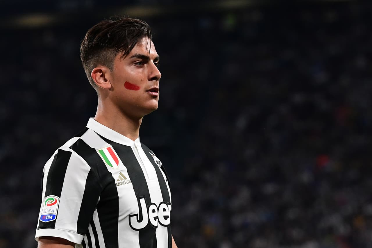 Juventus' Argentinian forward Paulo Dybala looks on during the Italian Serie A football match between Juventus and Napoli on April 22, 2018 at the Allianz Stadium in Turin. (Photo by MIGUEL MEDINA / AFP) (Photo credit should read MIGUEL MEDINA/AFP/Getty Images)