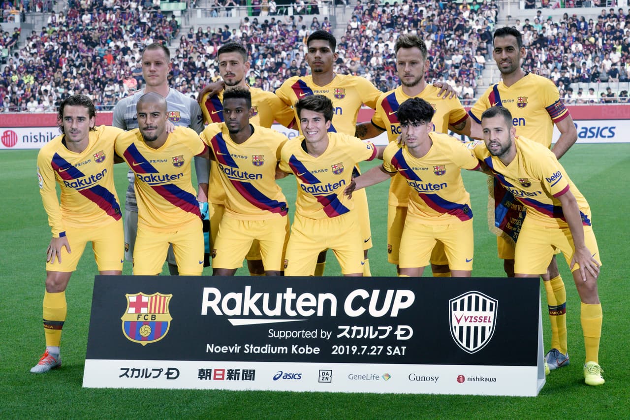 Players of FC Barcelona pose for photographers before a friendly soccer match between FC Barcelona and Vissel Kobe at Noevir Stadium in Kobe, western Japan Saturday, July 27, 2019. between FC Barcelona won 2-0. (AP Photo/Eugene Hoshiko)