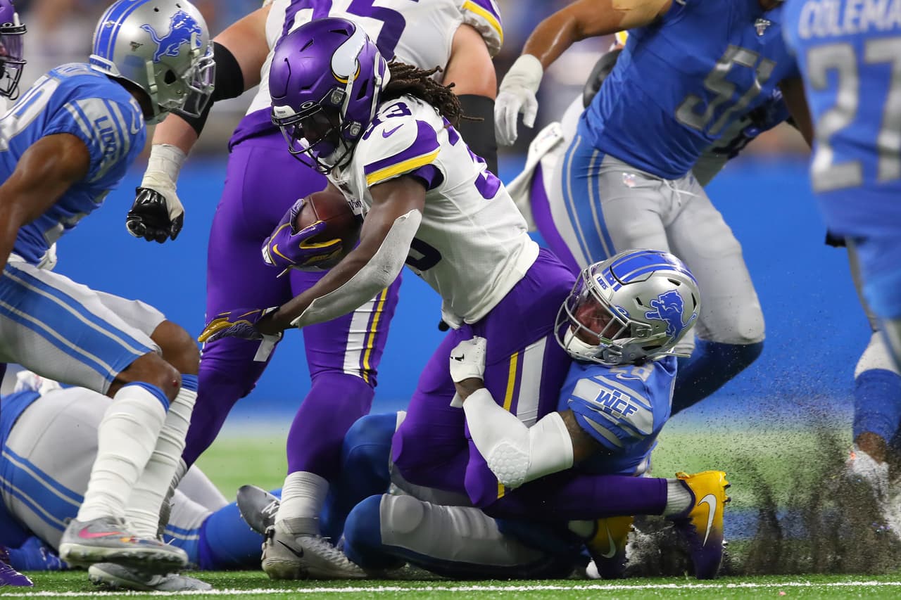 Kirk Cousins lanza 337 yardas y cuatro pases para tochdown. Los Vikings ganan 42-30 a los Detroit Lions.