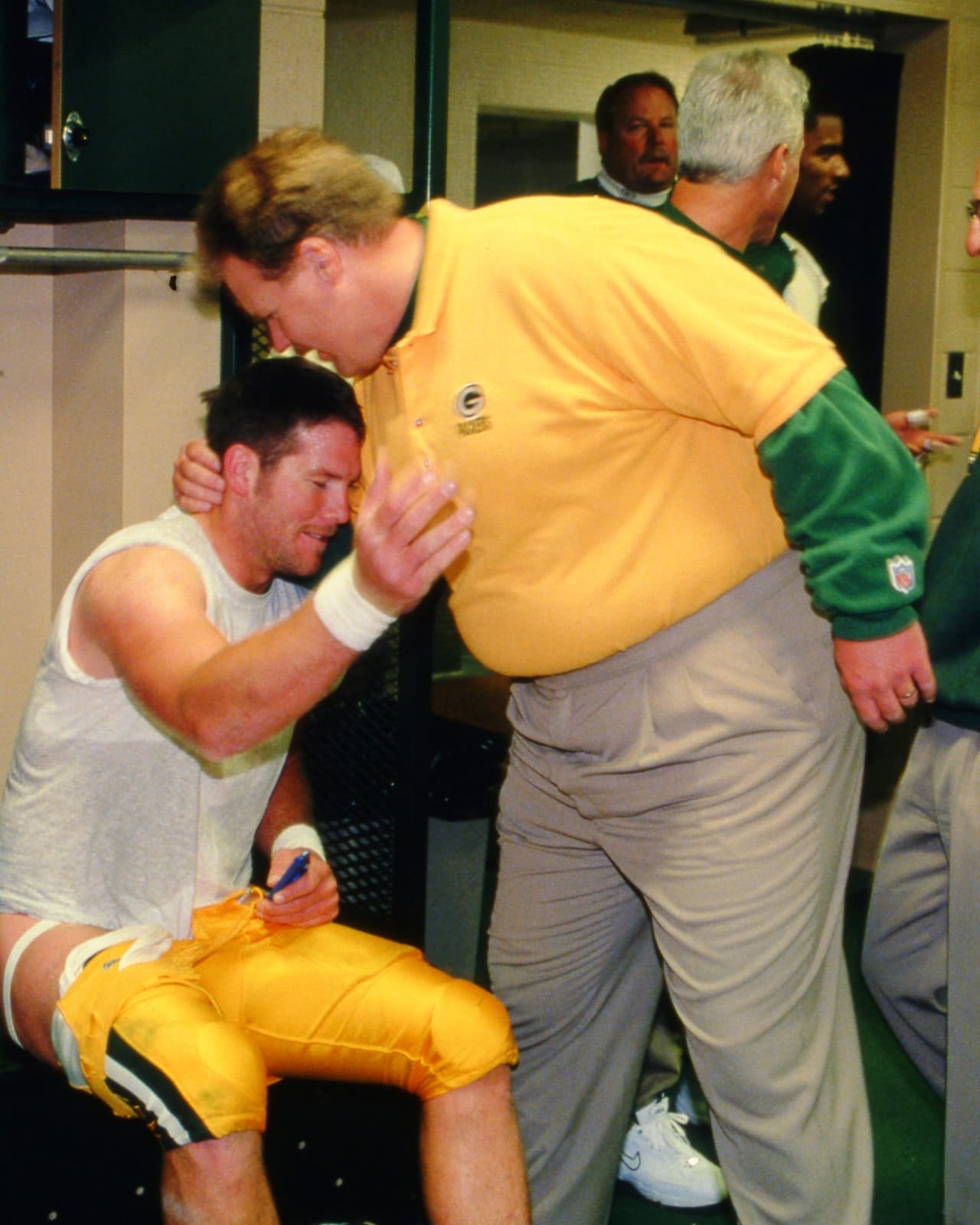 ANDY REID Campeón en el Super Bowl XXXI como entrenador de la línea ofensiva de los Green Bay Packers. Trabajó de cerca con Brett Favre.