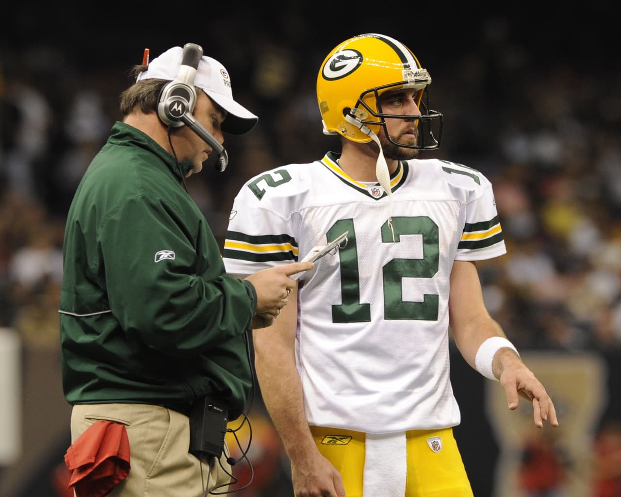 MIKE MCCARTHY Su campeonato lo consiguió ya como coach principal de los Green Bay Packers en el Super Bowl XLV sobre Pittsburgh Steelers. Es entrenador de los Packers desde 2006, lleva 10 temporadas, 8 de playoffs, incluyendo 5 veces el título divisional.