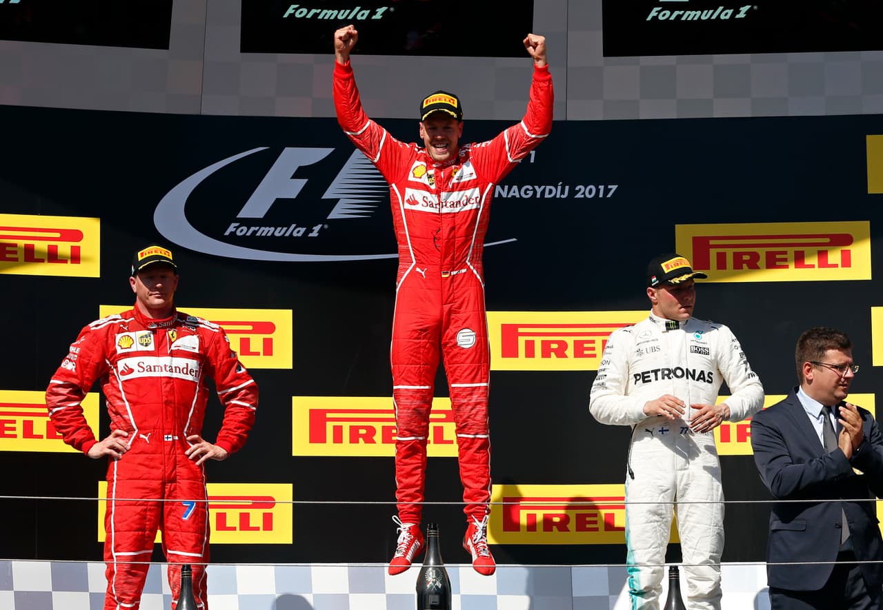 El podio en el Gran Premio de Hungría: Sebastian Vettel, Kimi Raikkinen y Valtteri Bottas.