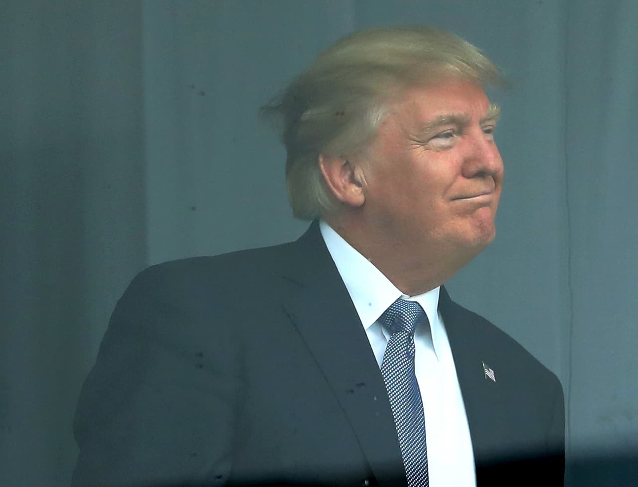 BEDMINSTER, NJ - JULY 14: U.S. President Donald Trump watches the U.S. Women's Open round two on July 14, 2017 at Trump National Golf Course in Bedminster, New Jersey. (Photo by Elsa/Getty Images)