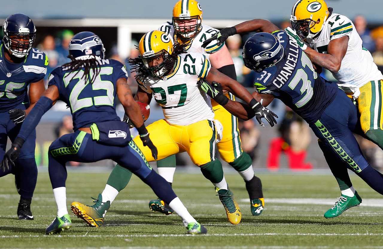 SEATTLE, WA - JANUARY 18: Eddie Lacy #27 of the Green Bay Packers carries the ball against the Seattle Seahawks during the 2015 NFC Championship game at CenturyLink Field on January 18, 2015 in Seattle, Washington. (Photo by Tom Pennington/Getty Images)