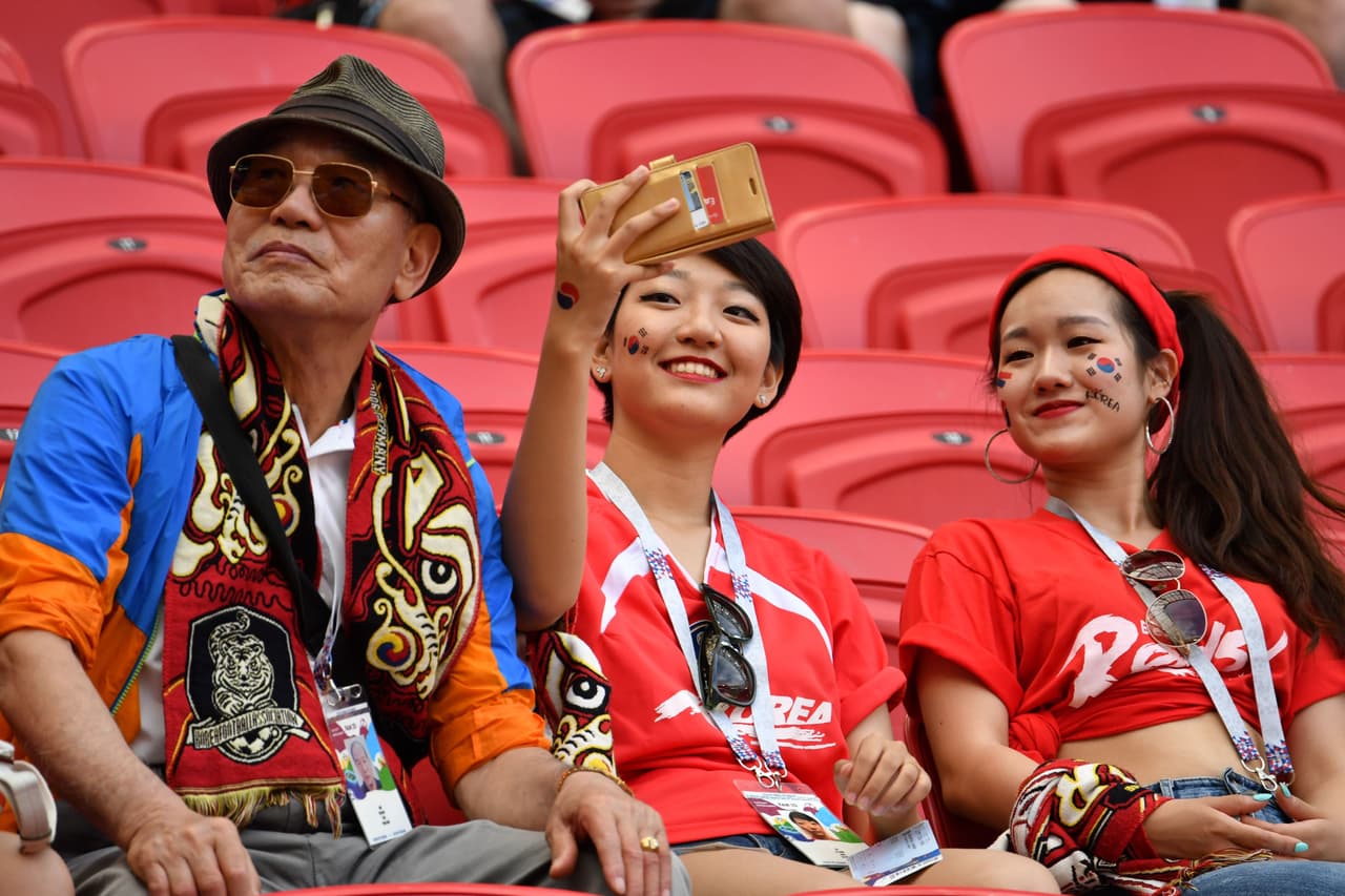 Fans cheer prior to the Russia 2018 World Cup Group F football match between South Korea and Germany at the Kazan Arena in Kazan on June 27, 2018. (Photo by SAEED KHAN / AFP) / RESTRICTED TO EDITORIAL USE - NO MOBILE PUSH ALERTS/DOWNLOADS (Photo credit should read SAEED KHAN/AFP/Getty Images)