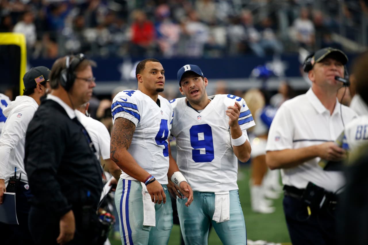 Dallas Cowboys quarterback Dak Prescott (4) and quarterback Tony Romo (9) talk on the sideline during an NFL Football game against the Baltimore Ravens on Sunday, Nov. 20, 2016, in Arlington, Texas. (AP Photo/Michael Ainsworth)