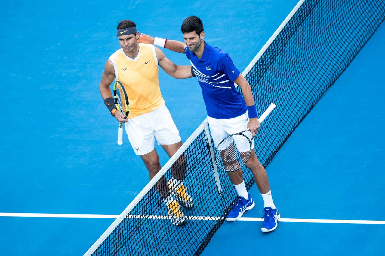 MELBOURNE, AUSTRALIA - JANUARY 27: Novak Djokovic of Serbia and Rafael Nadal of Spain pose for a photo ahead of the Men's Singles Final match during day 14 of the 2019 Australian Open at Melbourne Park on January 27, 2019 in Melbourne, Australia. (Photo by Fred Lee/Getty Images)