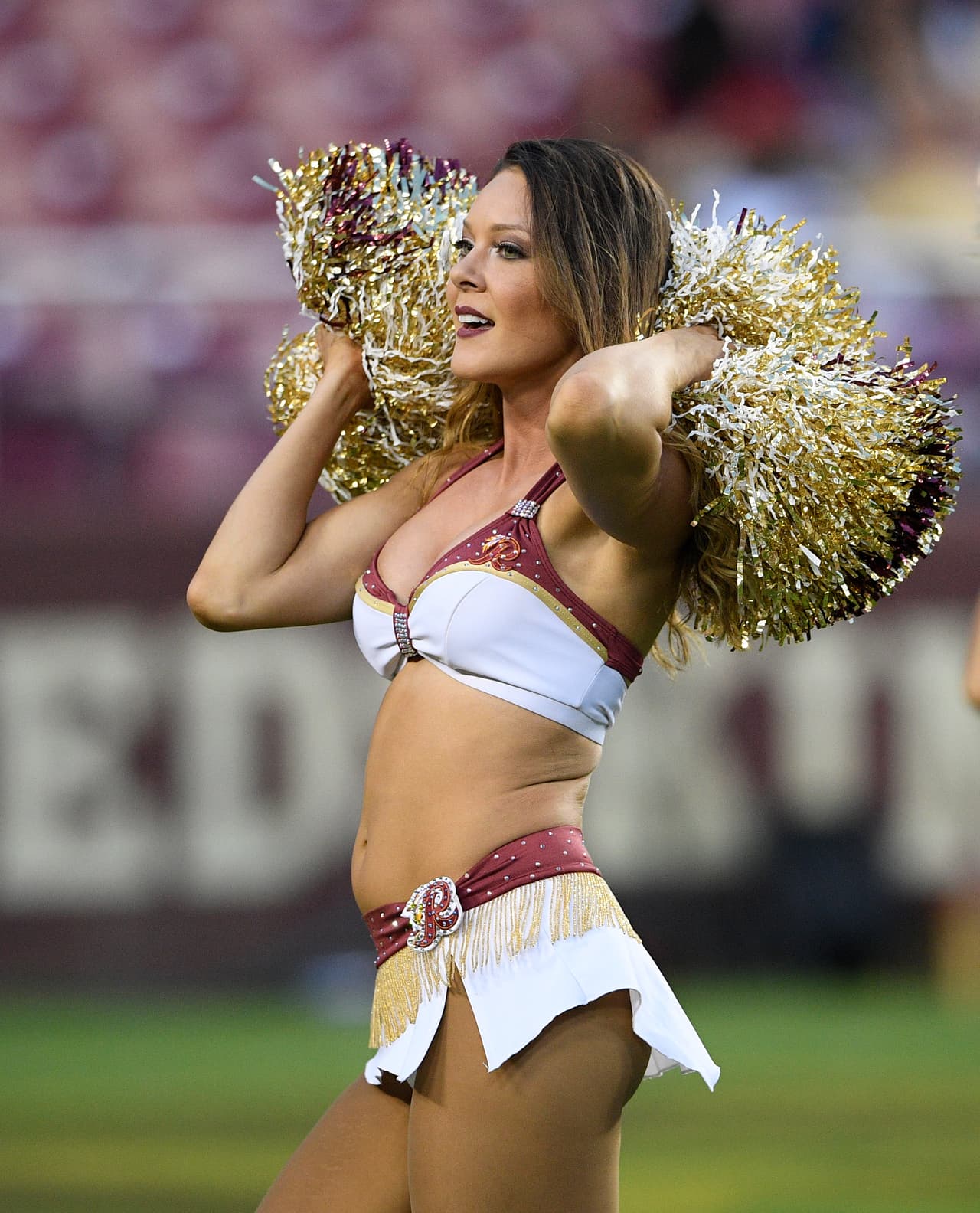 The Washington Redskins cheerleaders perform before a preseason NFL football game against the New York Jets, Thursday, Aug. 16, 2018, in Landover, Md. (AP Photo/Nick Wass)