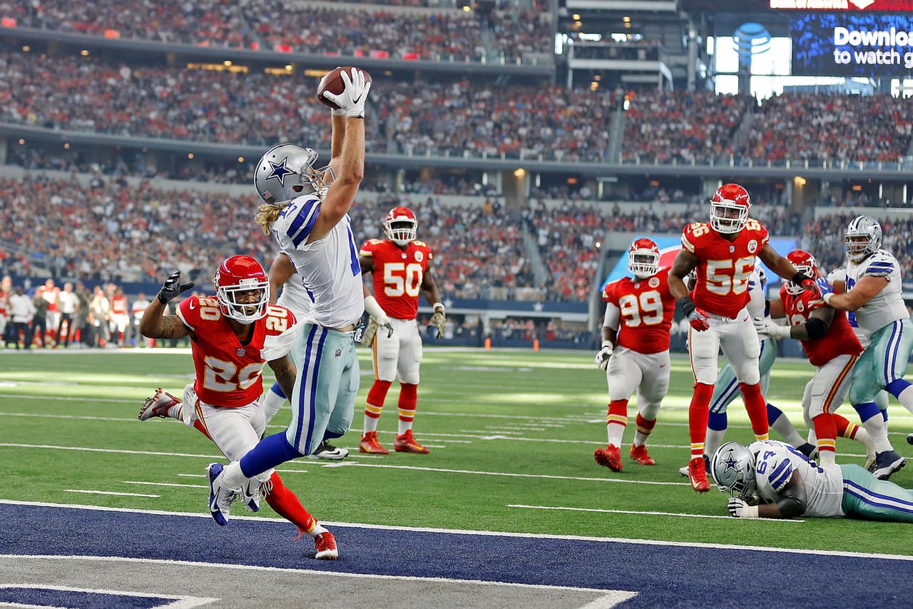 Dallas Cowboys receiver Cole Beasley (11) catches a six yard touchdown pass as Kansas City Chiefs cornerback Stephen Nelson (20) defends during a 2017 NFL week 9 regular season game, Sunday, Nov. 5, 2017 in Arlington, Texas. The Cowboys defeated the Chiefs, 28-17. (James D. Smith via AP)