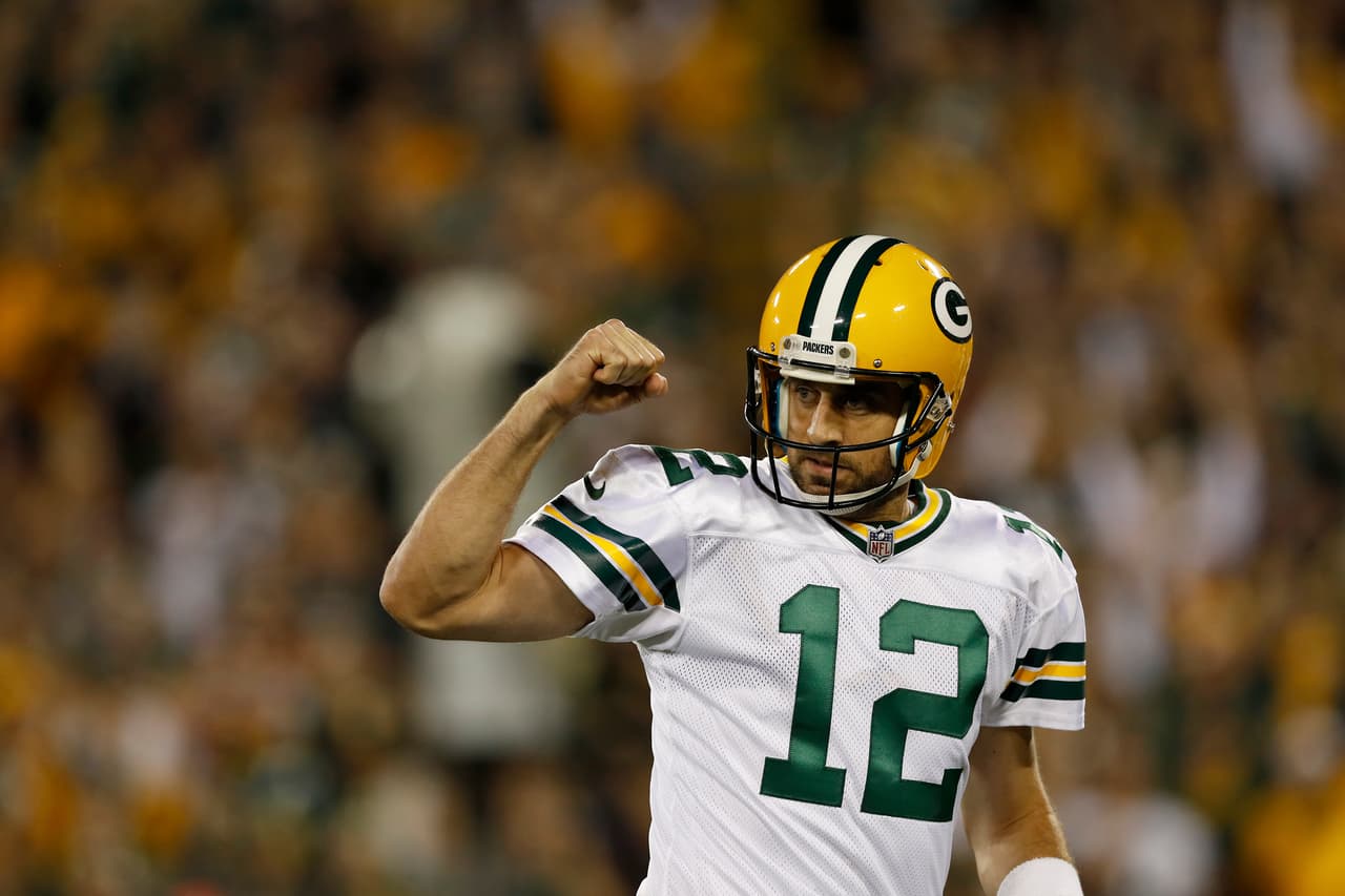 Green Bay Packers quarterback Aaron Rodgers (12) celebrates after leading his team a touchdown during an NFL football game against the Chicago Bears on Thursday, Sept. 28, 2017 in Green Bay, Wis. (Aaron M. Sprecher via AP)