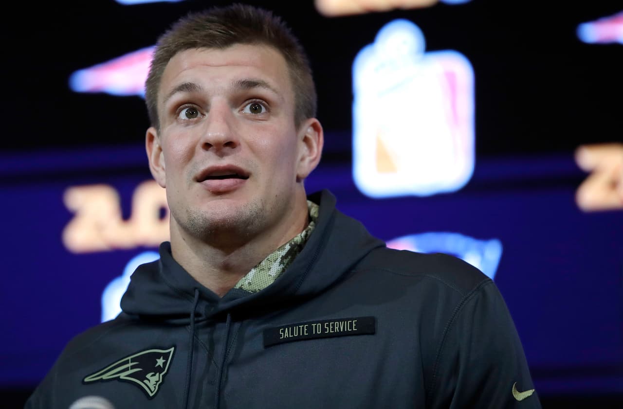 New England Patriots tight end Rob Gronkowski, wearing an outfit to acknowledge the Salute to Service military appreciation campaign, speaks to the media following an NFL football game against the Seattle Seahawks, Monday, Nov. 14, 2016, in Foxborough, Mass. (AP Photo/Charles Krupa)