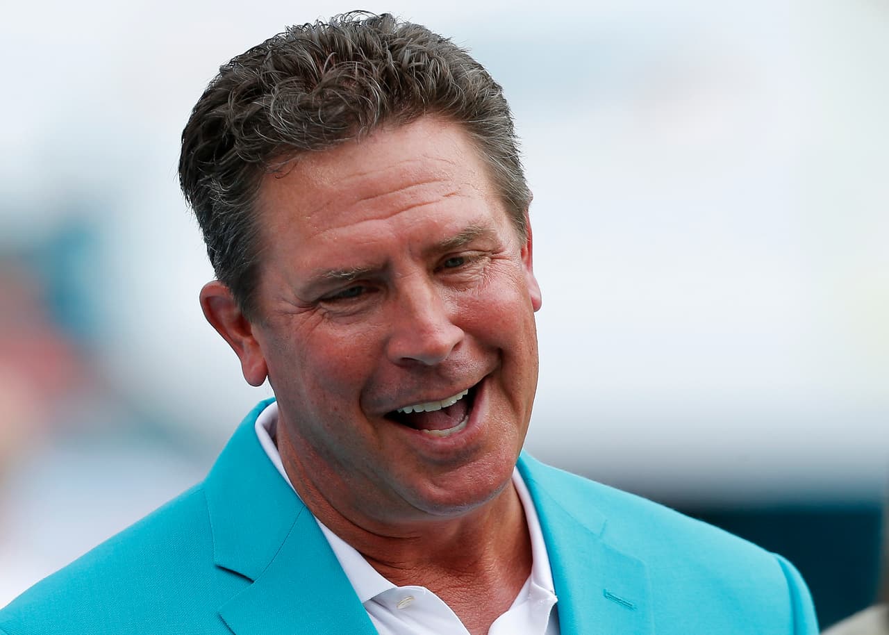 MIAMI GARDENS, FL - SEPTEMBER 21: Former Miami Dolphins quarterback Dan Marino stands on the sideline before a game between the Dolphins an the Kansas City Chiefs at Sun Life Stadium on September 21, 2014 in Miami Gardens, Florida. (Photo by Joel Auerbach/Getty Images)