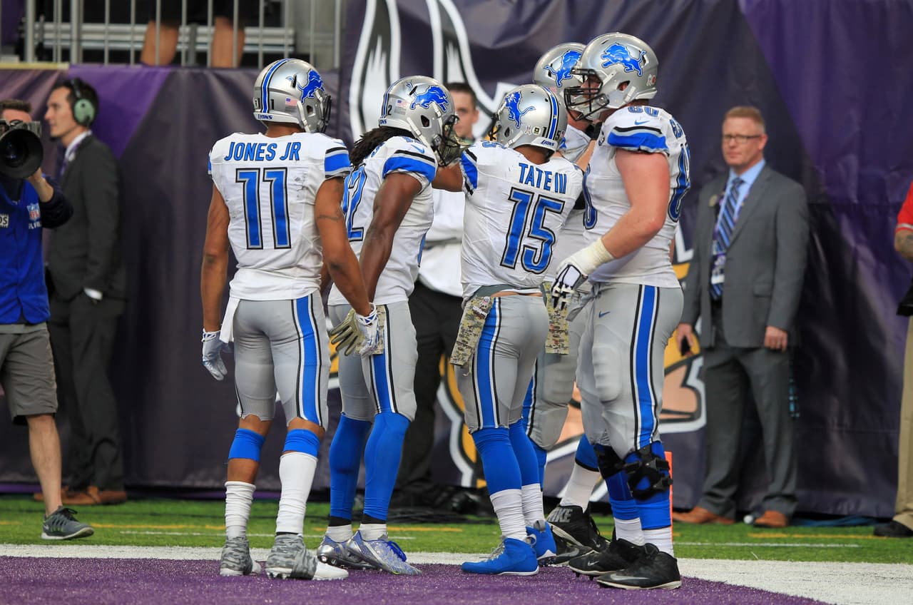 Detroit Lions wide receiver Golden Tate (15) celebrates with teammates after catching a 28-yard touchdown pass during overtime in an NFL football game against the Minnesota Vikings Sunday, Nov. 6, 2016, in Minneapolis. The Lions won 22-16. (AP Photo/Andy Clayton-King)