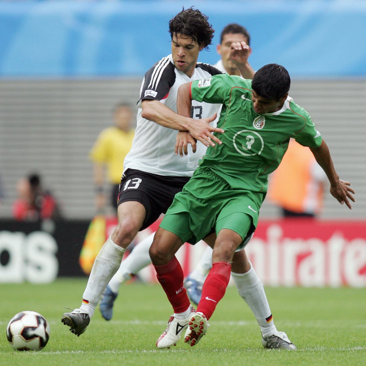 LEIPZIG, Germany: German midfielder Michael Ballack (L) vies with Mexican defender Carlos Salcido during the Confederations cup third place final football match Germany vs Mexico, 29 June 2005 at the Zentral stadium in Leipzig. AFP PHOTO JOHANNES SIMON (Photo credit should read JOHANNES SIMON/AFP/Getty Images)