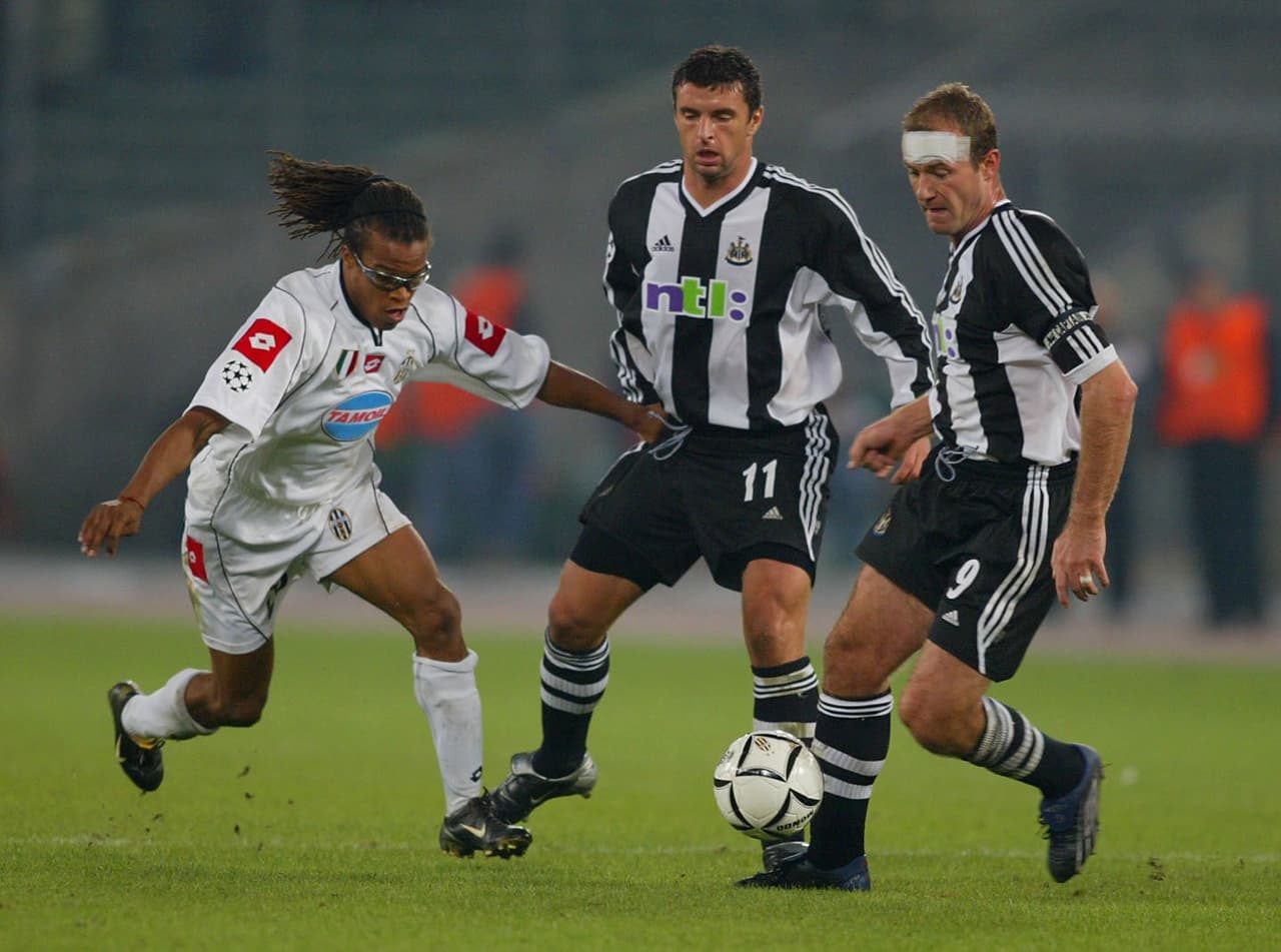 TURIN - OCTOBER 1: Alan Shearer and Gary Speed of Newcastle United and Edgar Davids of Juventus in action during the UEFA Champions League, Group E match between Juventus and Newcastle United at Stadio Delle Alpi, Turin in Italy on October 1, 2002. (Photo by Phil Cole/Getty Images)