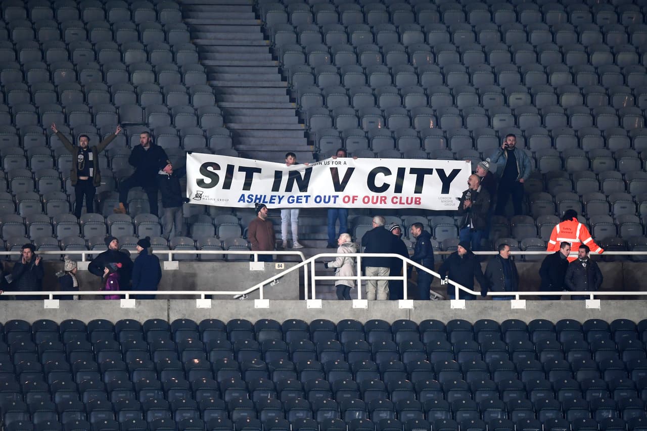 NEWCASTLE UPON TYNE, ENGLAND - JANUARY 29: Newcastle United fans perform a sit in as a protest against Mike Ashley after the Premier League match between Newcastle United and Manchester City at St. James Park on January 29, 2019 in Newcastle upon Tyne, United Kingdom. (Photo by Michael Regan/Getty Images)