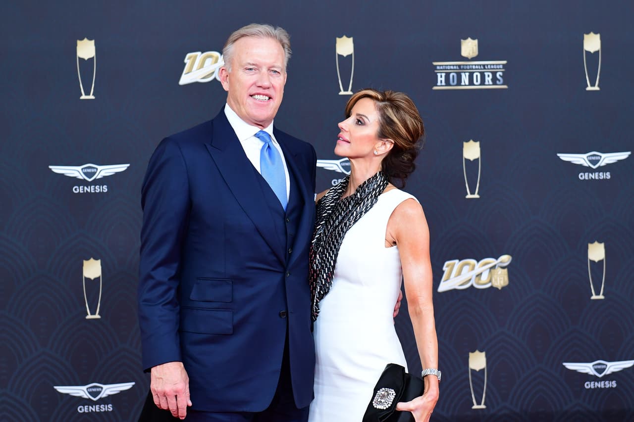 John Elway y Paige Green