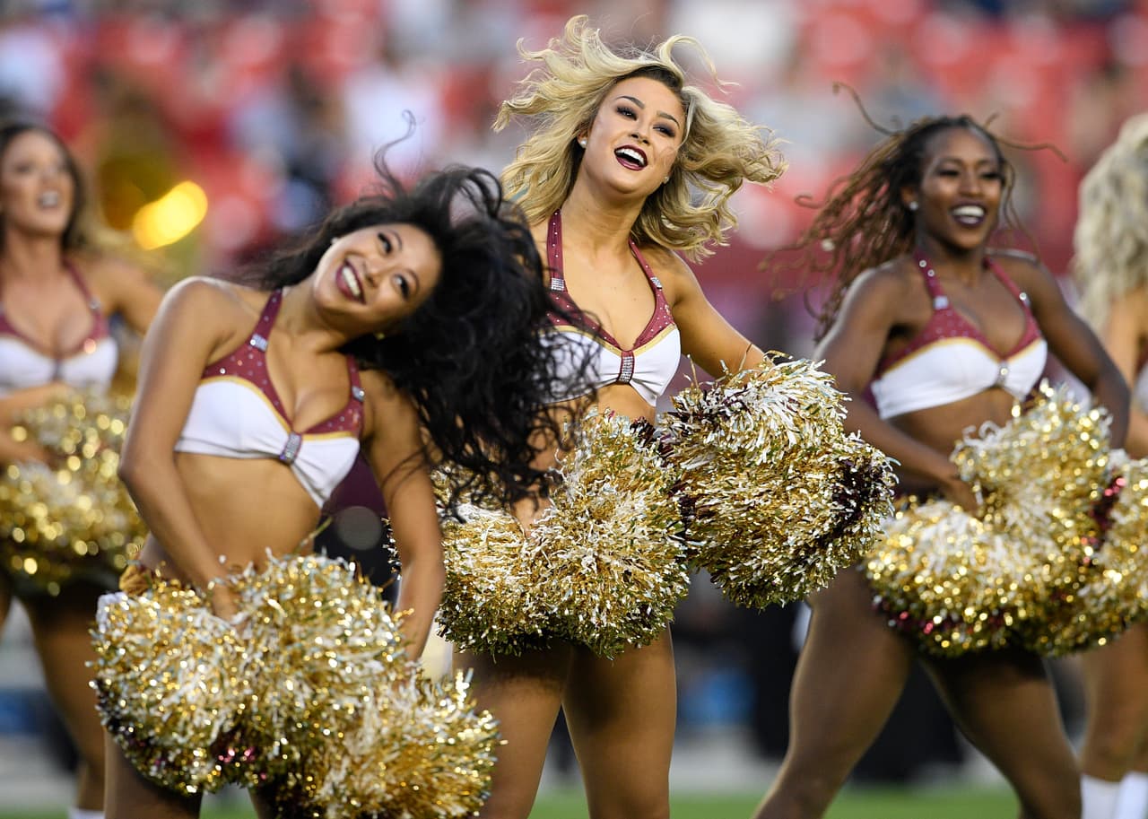 The Washington Redskins cheerleaders perform before a preseason NFL football game against the New York Jets, Thursday, Aug. 16, 2018, in Landover, Md. (AP Photo/Nick Wass)