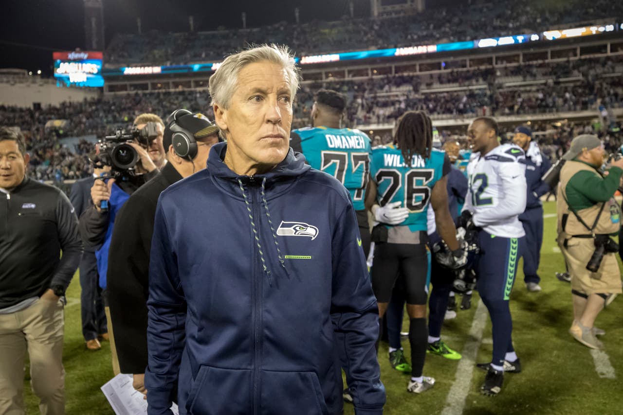 Seattle Seahawks head coach Pete Carroll walks off the field after the end of an NFL football game against the Jacksonville Jaguars, Sunday, Dec. 10, 2017, in Jacksonville, Fla. The Jaguars beat the Seahawks 30-24. (AP Photo/Stephen B. Morton)