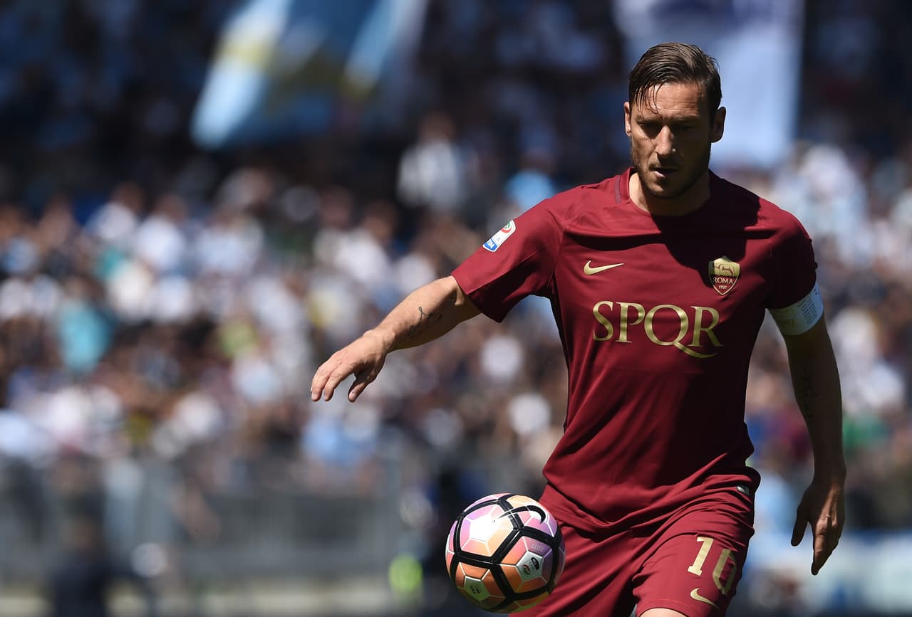 Roma's forward from Italy Francesco Totti controls the ball during the Italian Serie A football match Roma vs Lazio at the Olympic Stadium in Rome on April 30, 2017. / AFP PHOTO / FILIPPO MONTEFORTE (Photo credit should read FILIPPO MONTEFORTE/AFP/Getty Images)