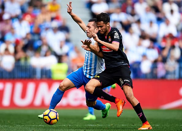 MALAGA, SPAIN - FEBRUARY 04: Charles Dias de Oliveira of Malaga CF (L) competes for the ball with Diego Antonio Reyes of RCD Espanyol (R) during La Liga match between Malaga CF and RCD Espanyol at La Rosaleda Stadium February 04, 2017 in Malaga, Spain. (Photo by Aitor Alcalde Colomer/Getty Images)