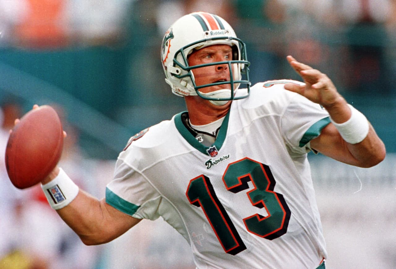 MIAMI, : Miami Dolphins quarterback Dan Marino gets ready to throw a pass in first quarter action in Mimi's NFL season opener against the Indianapolis Colts 31 August at Pro Player Stadium in Miami, FL. Marino is starting his 15th year as Dolphins quarterback. AFP PHOTO/Rhona WISE (Photo credit should read RHONA WISE/AFP/Getty Images)