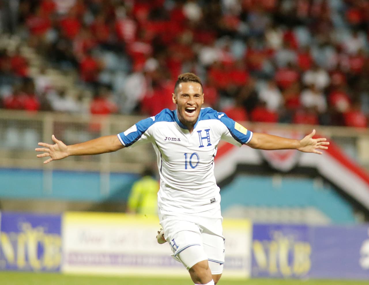 Honduras' midfielder Alex Lopez celebrates after scoring against Trinidad and Tobago during their FIFA World Cup 2018 CONCACAF qualifiers football match in Couva, Trinidad and Tobago, on September 1, 2017. / AFP PHOTO / ALVA VIARRUEL (Photo credit should read ALVA VIARRUEL/AFP/Getty Images)