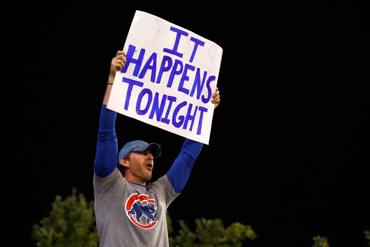 CLEVELAND, OH - NOVEMBER 02: A fan holds a sign during Game Seven of the 2016 World Series between the Chicago Cubs and the Cleveland Indians at Progressive Field on November 2, 2016 in Cleveland, Ohio. (Photo by Gregory Shamus/Getty Images)
