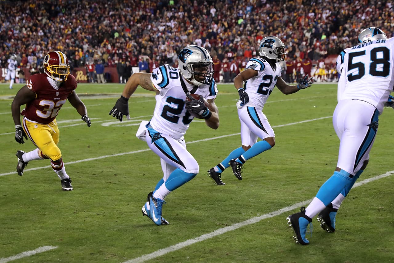 LANDOVER, MD - DECEMBER 19: Strong safety Kurt Coleman #20 of the Carolina Panthers intercepts the ball and carries it back past running back Rob Kelley #32 of the Washington Redskins in the first quarter at FedExField on December 19, 2016 in Landover, Maryland. (Photo by Rob Carr/Getty Images)